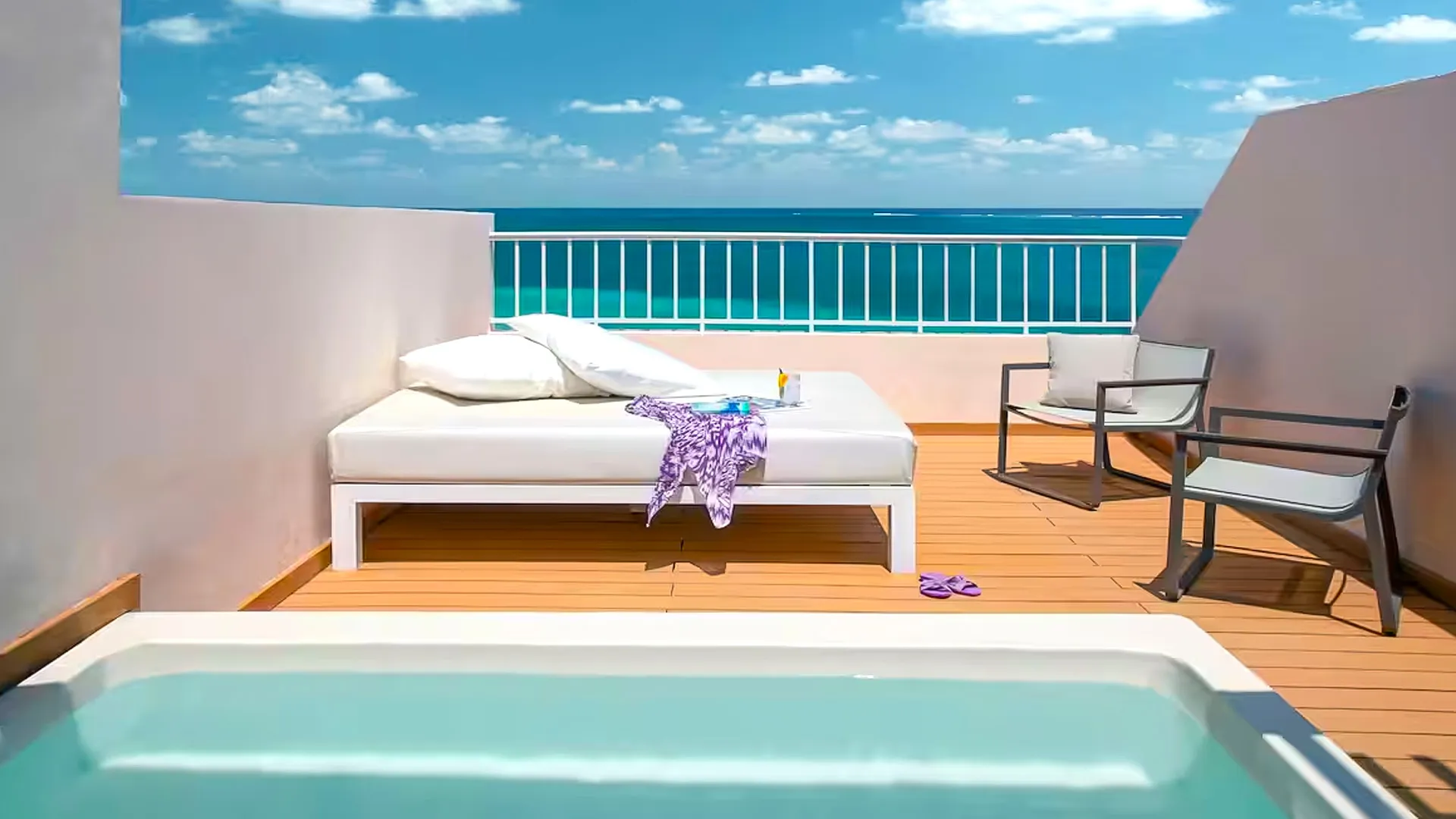 rooftop deck with private plunge pool and sunbed overlooking the Caribbean