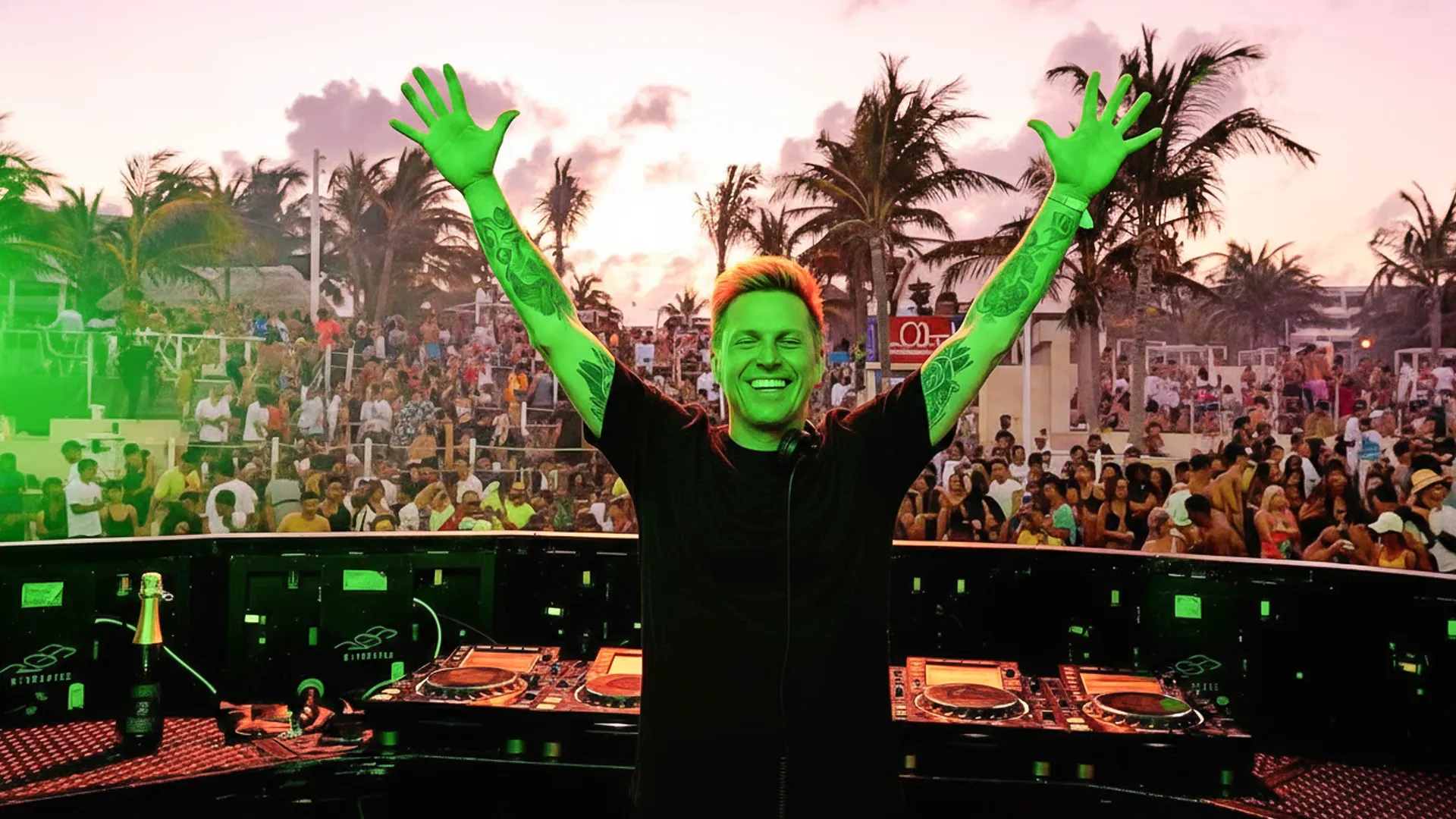  A vibrant view of Kinky Night Club during a Spring Break event, with a DJ performing on stage and a lively crowd in Cancun.