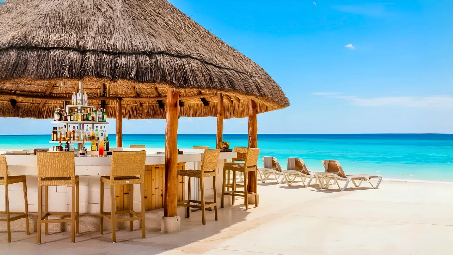 A relaxing beach chair setup on the sand at Krystal Cancun, ideal for sunbathing and enjoying the peaceful ocean breeze.