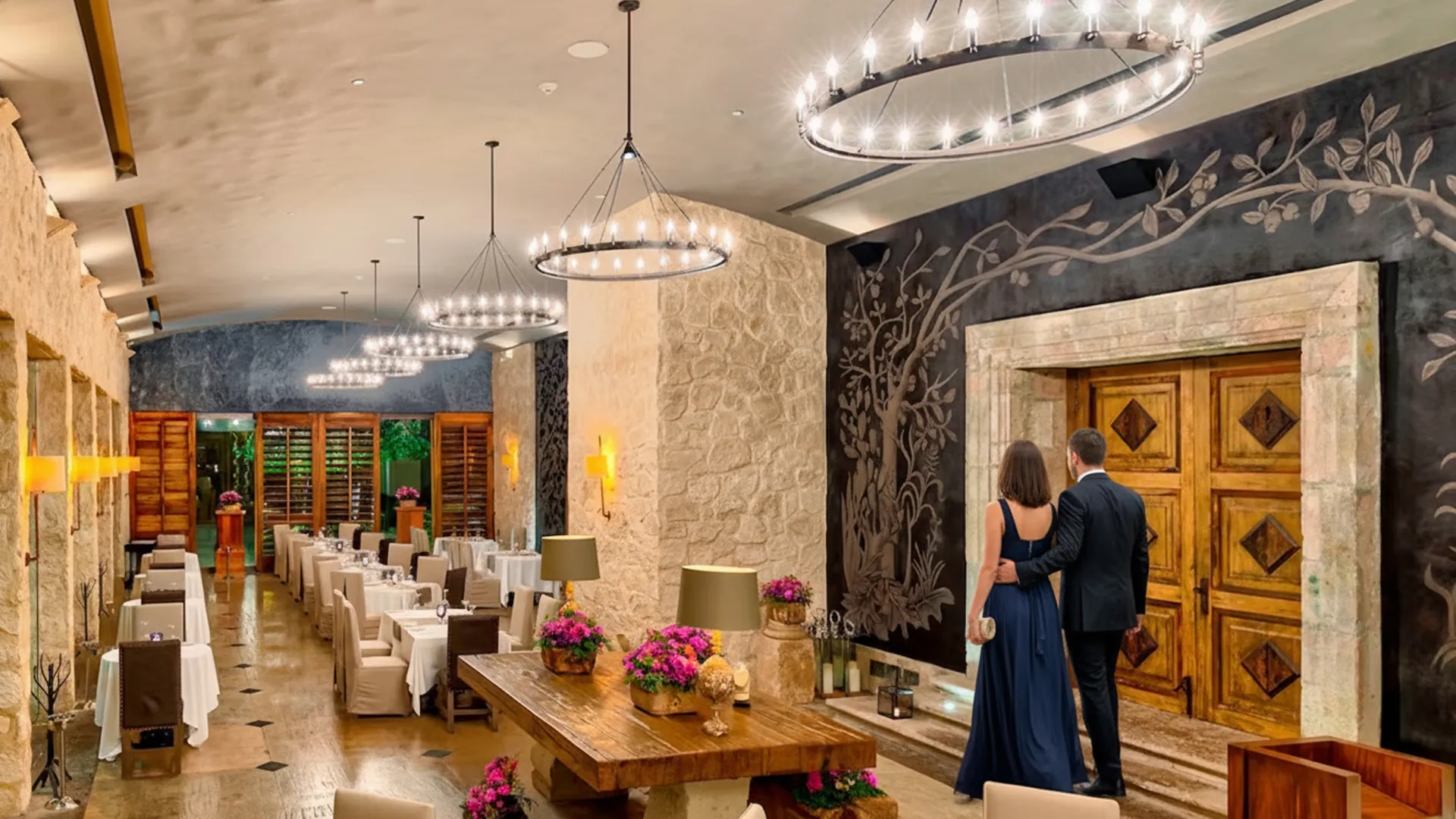 Elegant dining room at Nizuc Resort Cancun with ambient lighting, stone walls, and refined décor.