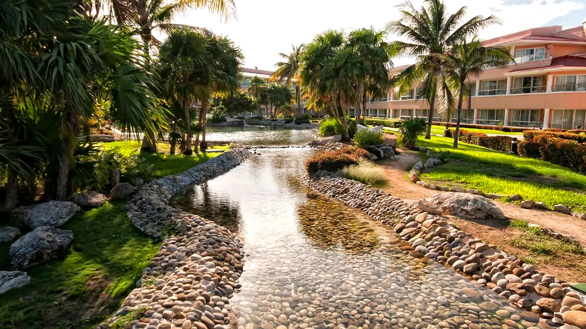 What is the difference between Moon Palace and The Grand at Moon Palace in Cancun?