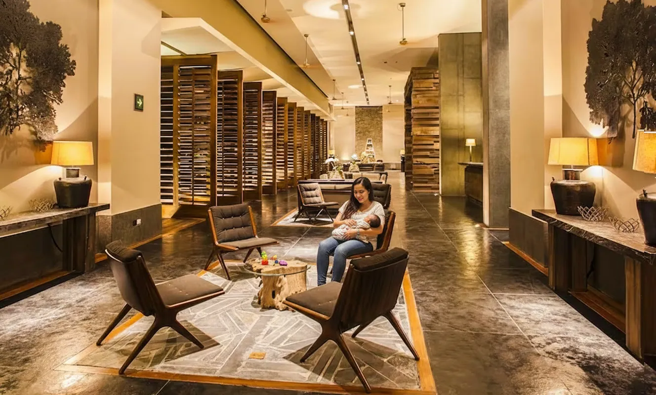 Elegant lobby lounge at Nizuc Resort Cancun featuring warm lighting, modern decor, and relaxing seating area.