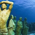 Explore the Cancun Underwater Museum: Snorkeling, Diving, or Glass-Bottom Boat?