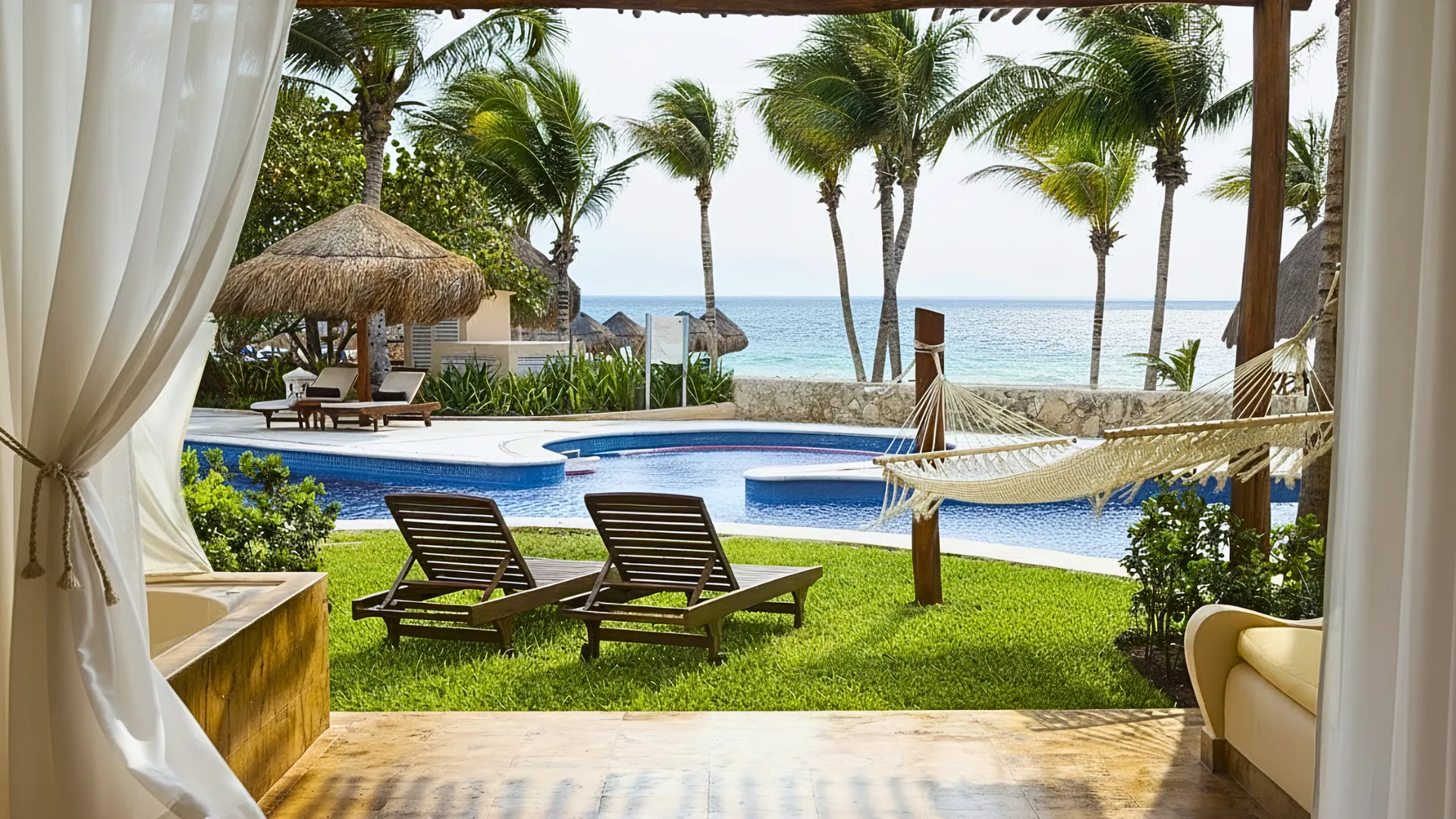View of a private beach hammock from a room at Excellence Riviera Cancun.