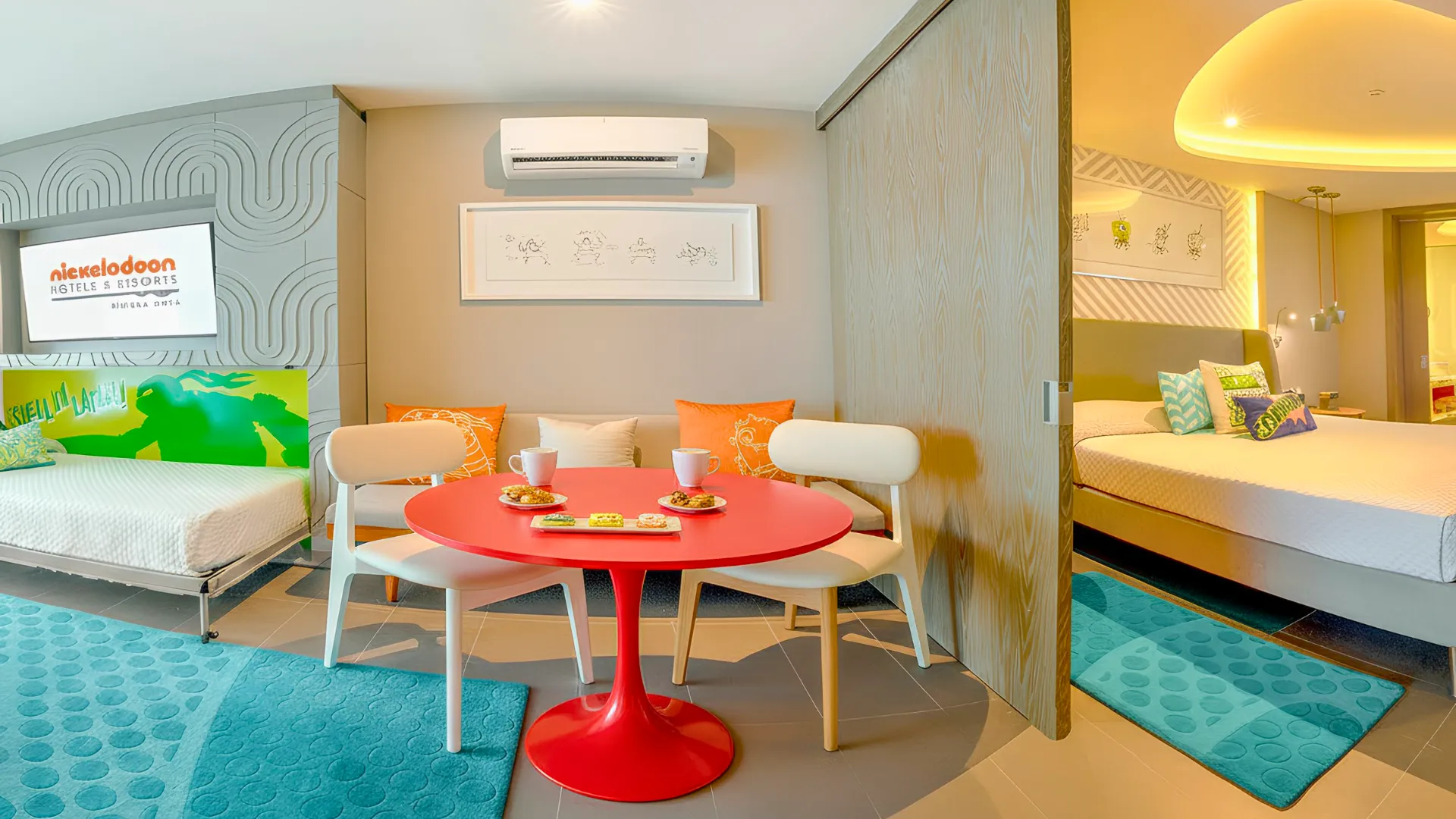 Family suite interior at Nickelodeon Hotels & Resorts Riviera Maya with colorful decor and family-friendly layout.