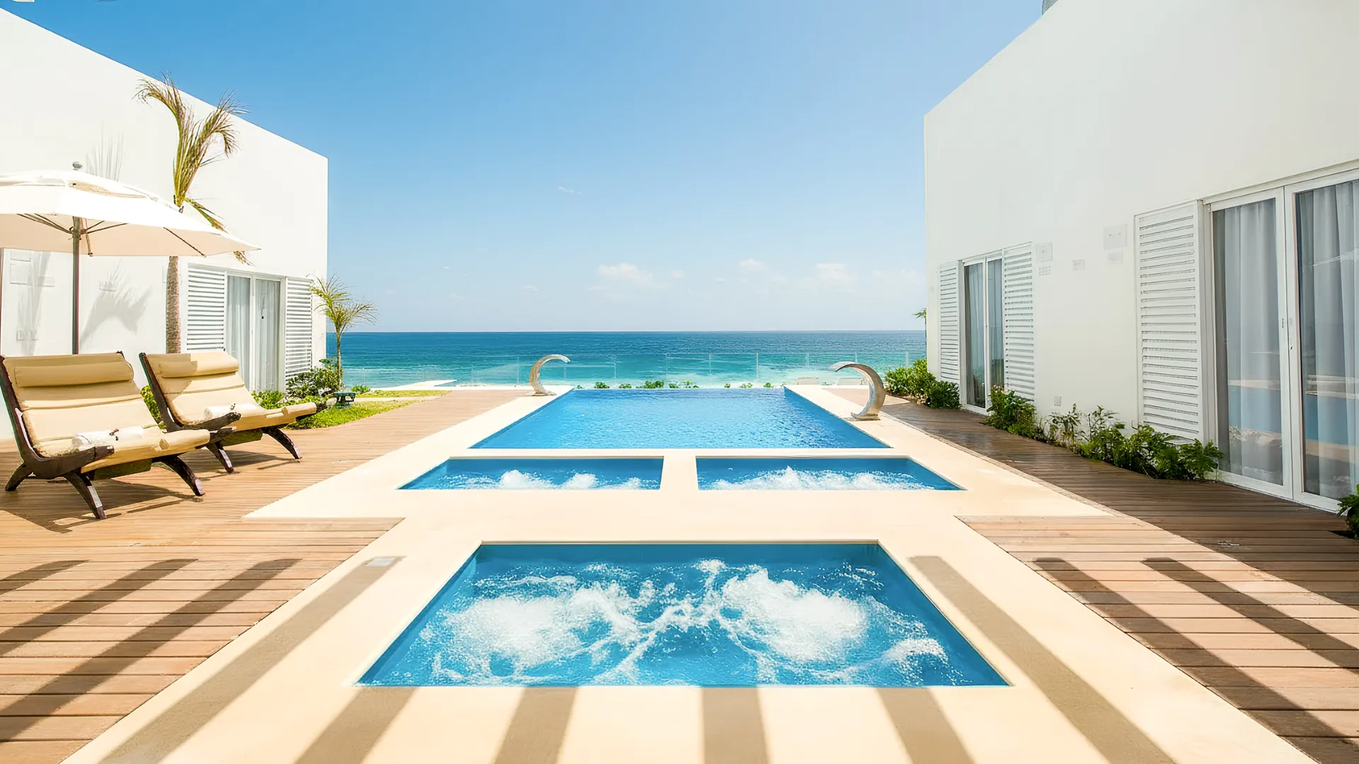 Infinity pool with ocean views at Óleo Cancun Playa, perfect for a relaxing vacation.