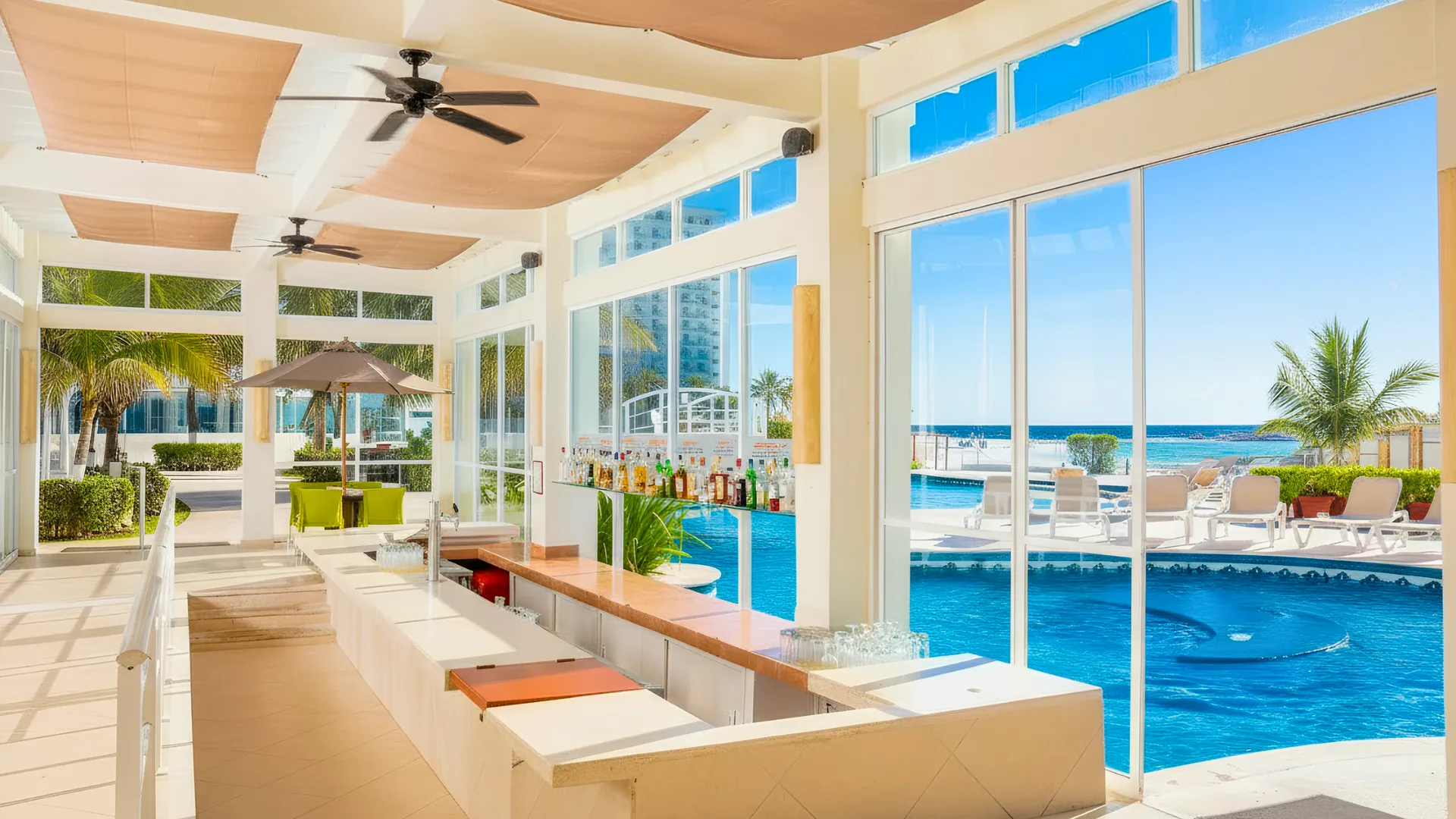 Luxurious lounge area with ocean view and modern furniture at Krystal Cancun.